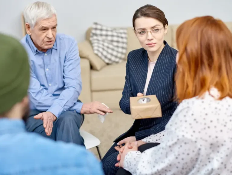 Attorney discussing a guardianship matter with family members